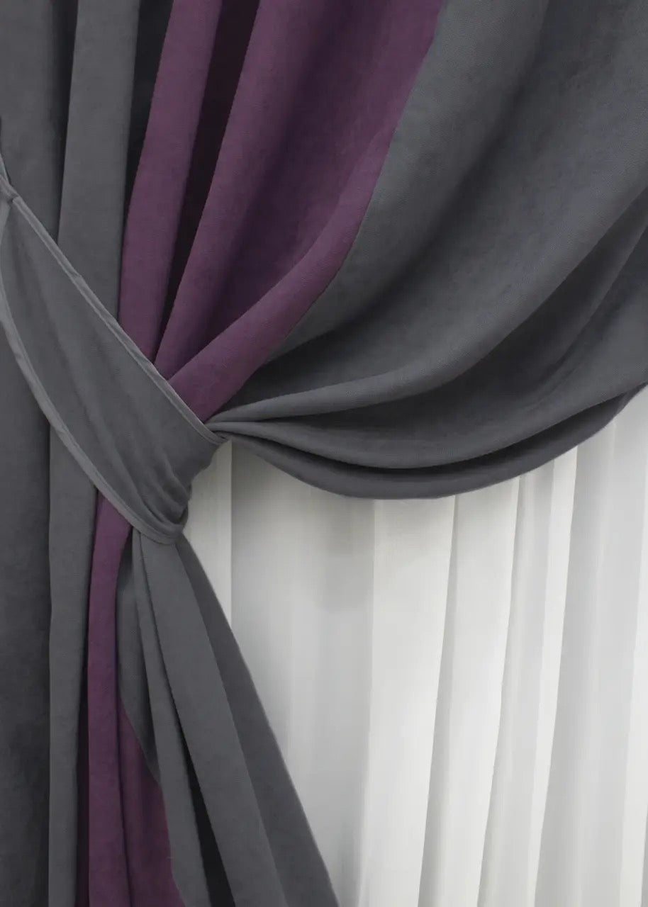 Modern graphite and deep plum curtains from the "Velour Luxe" collection, providing a rich contrast and sophisticated color-blocking design.
