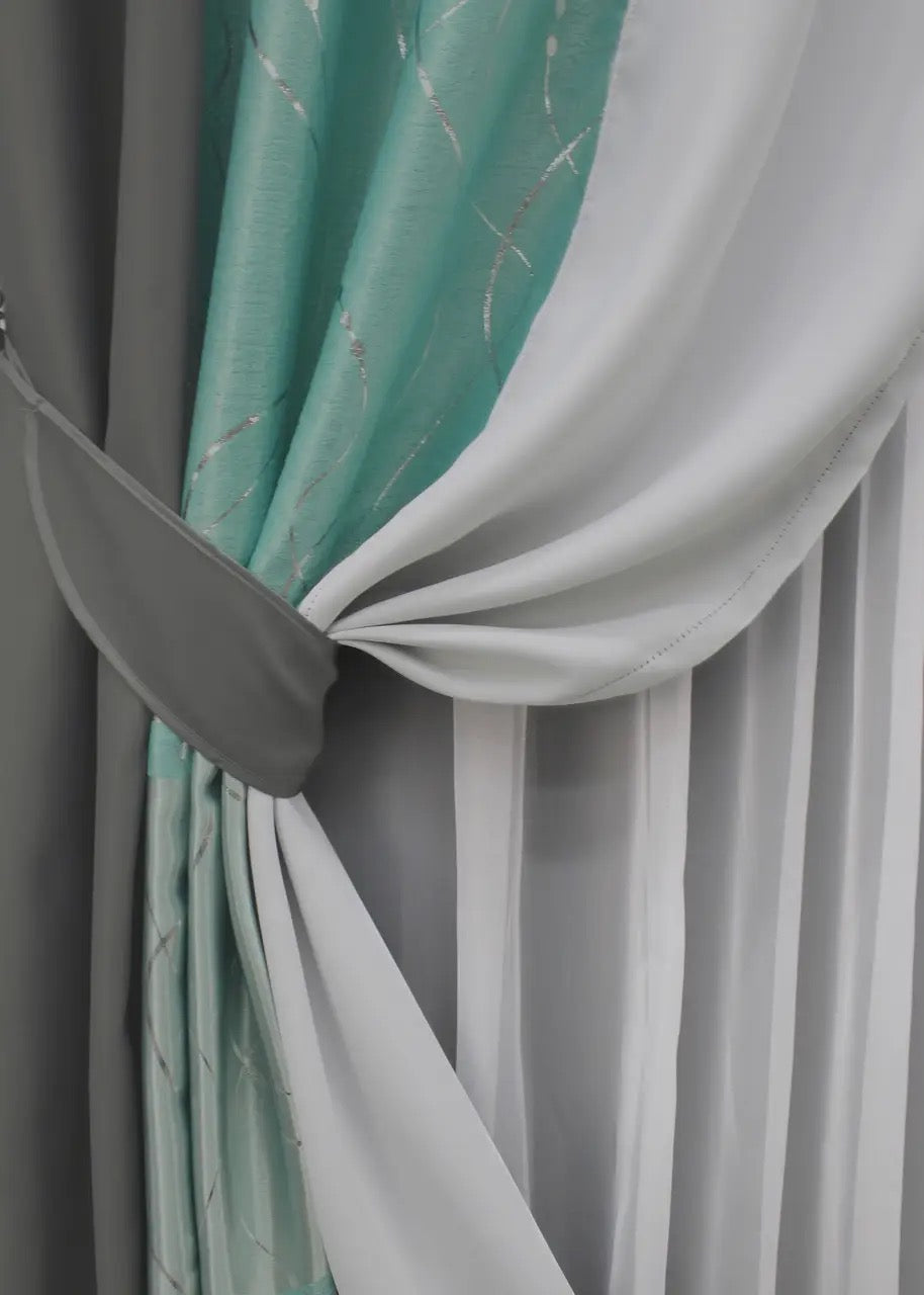 Modern graphite & turquoise-grey curtains with an elegant contrast design, ideal for enhancing any contemporary living space.
