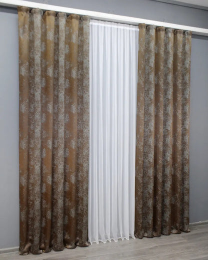 Premium linen curtains in warm copper and grey, designed for stylish and cosy living spaces.
