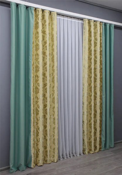 Sophisticated turquoise and beige two-tone blackout curtains, creating a cozy and inviting atmosphere in your home.
