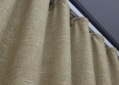 Minimalist light beige linen curtains with soft filtering properties, creating a bright yet cosy ambiance.
