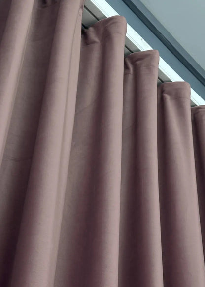 Muted lilac velvet blackout curtains with a high-quality plush finish, designed to complement modern, classic, and vintage-style interiors.
