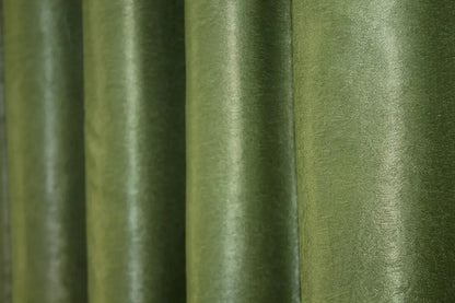 Muted olive green linen curtains, featuring a gentle and elegant drape, ideal for stylish and contemporary home decoration.
