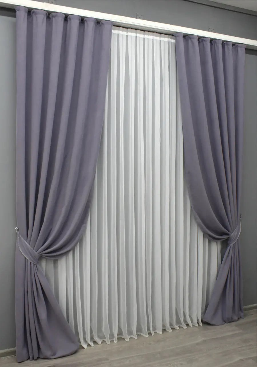 Delicate lavender grey drapes, offering privacy and refined elegance in any contemporary space.
