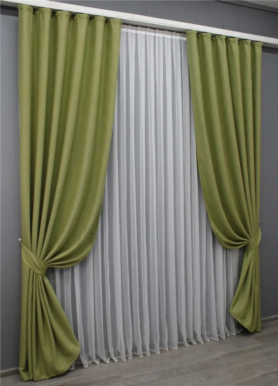 Muted sage green linen curtains with a soft matte finish, enhancing contemporary and farmhouse-style home décor.
