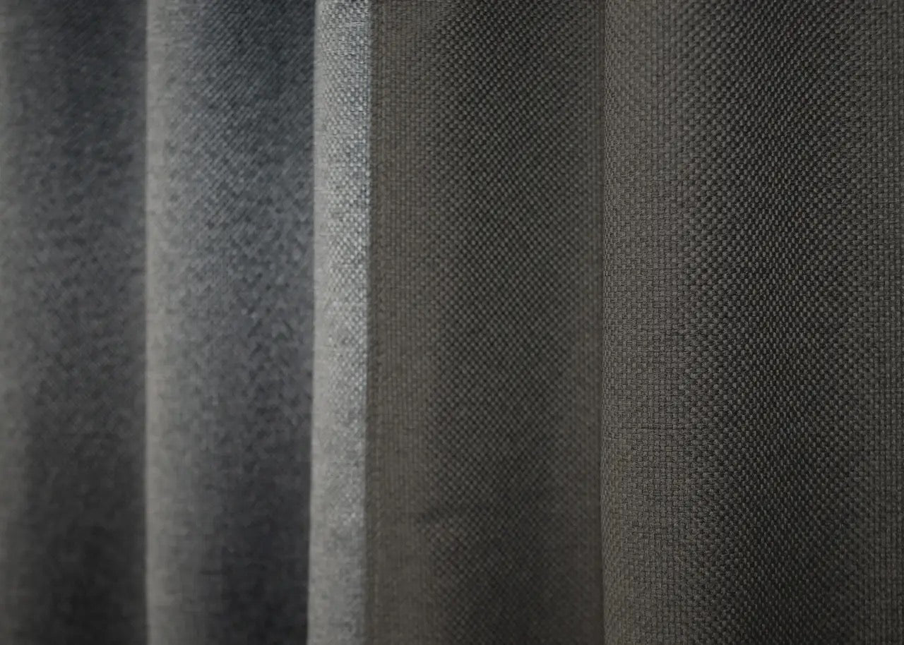 Natural Blend collection’s grey two-tone linen blackout curtains designed to reduce light while adding a touch of elegance to your decor.
