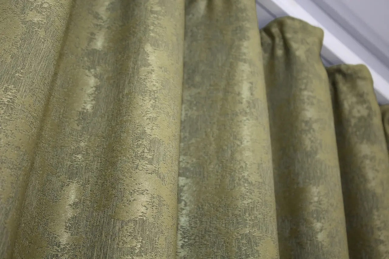 Natural olive curtains with a sophisticated tone, blending seamlessly into contemporary and classic interior designs.
