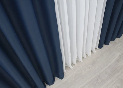 Navy blue blackout curtains with a rich, sophisticated look for modern interiors.
