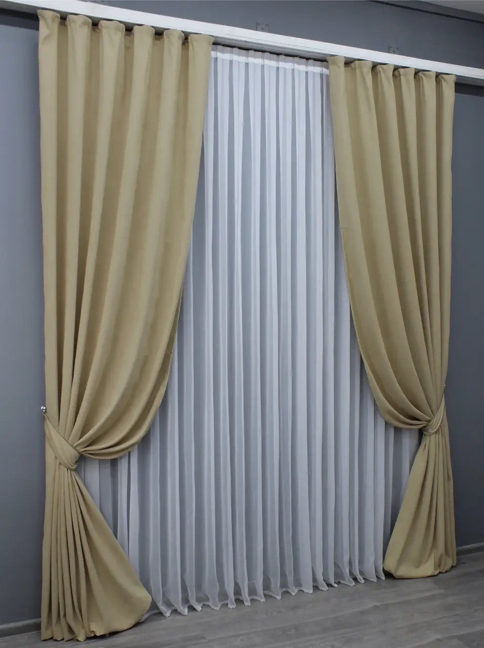 Neutral beige velvet curtains designed for privacy and soft natural light diffusion.
