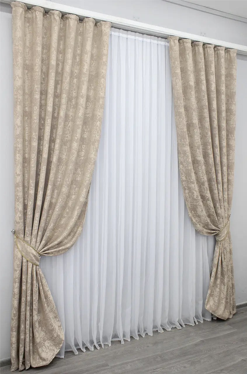 Stylish grey-beige jacquard curtains designed for privacy and light filtering, allowing soft natural light to create a serene ambiance.
