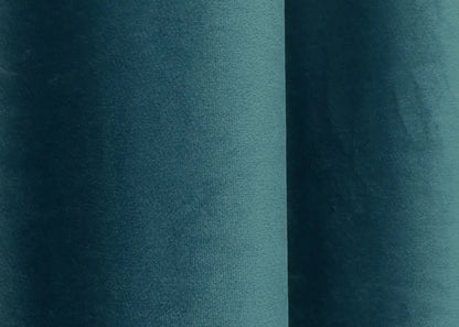 Ocean blue velvet blackout drapes, ideal for luxurious and stylish window treatments.
