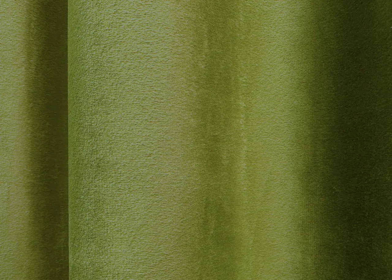 Luxurious olive green velvet curtains featured in an exclusive Spring Sale event.
