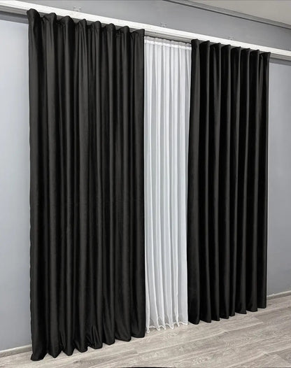 Onyx premium velvet curtains with plush texture, perfect for reducing glare and enhancing privacy.
