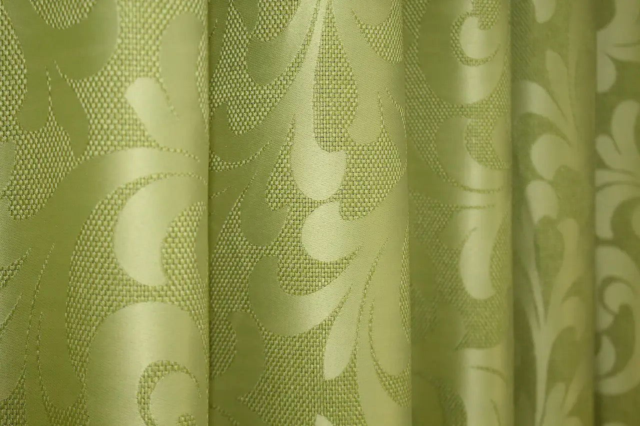 Classic olive green Venzel curtains with a timeless decorative design, ideal for sophisticated home styling.
