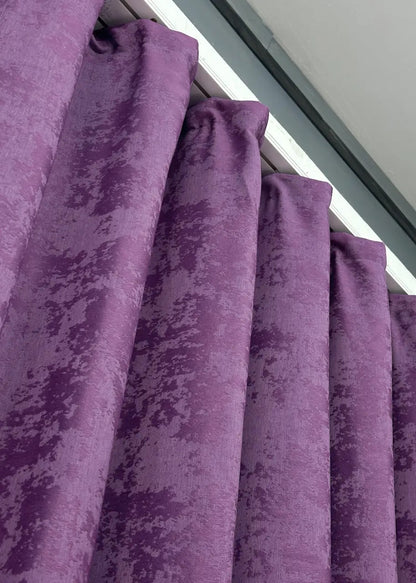 Luxurious pale violet curtains with sophisticated tones, seamlessly blending into elegant and modern interior designs.
