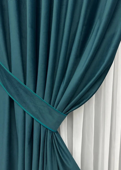 Peacock green premium velvet curtains with plush texture, perfect for reducing glare and enhancing privacy.
