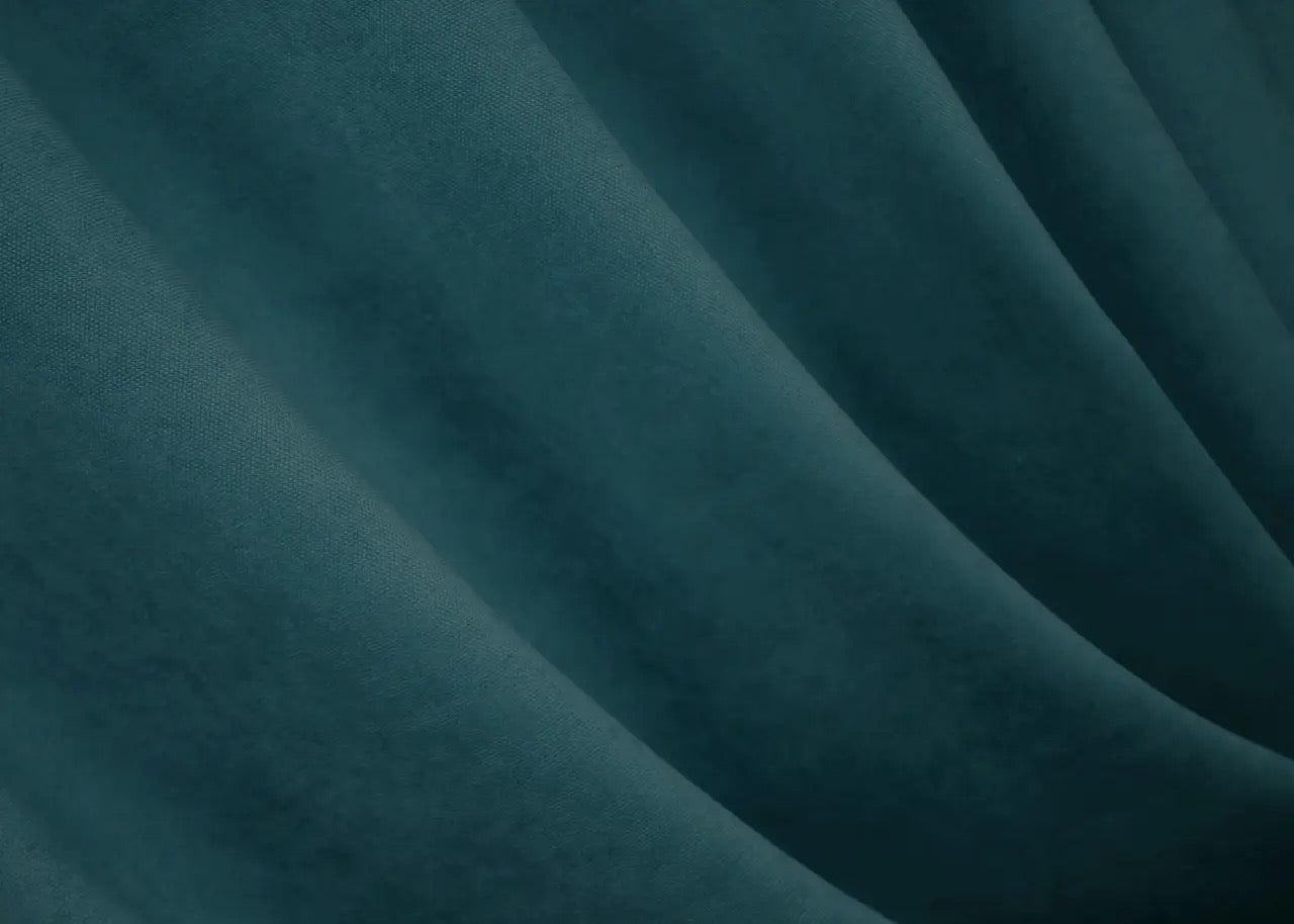 Sophisticated azure blue velvet curtains designed for elegant homes with a touch of luxury.
