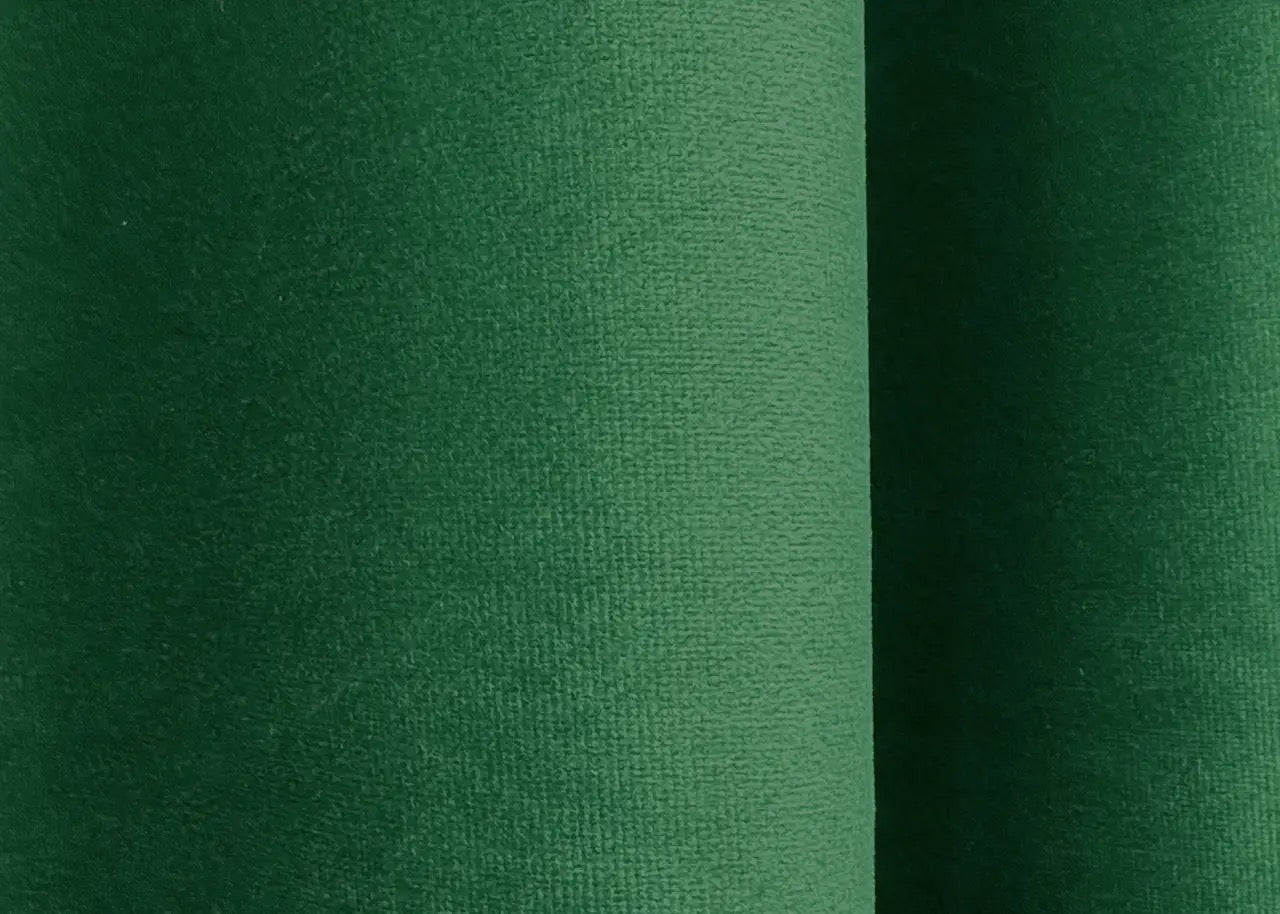 Moss green velvet curtains with a rich and smooth texture, ideal for elegant window treatments in living rooms and bedrooms.
