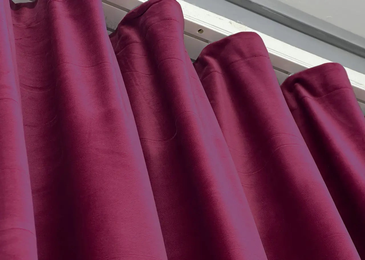 Pomegranate velvet room darkening curtains, designed for modern and sophisticated interior styling.
