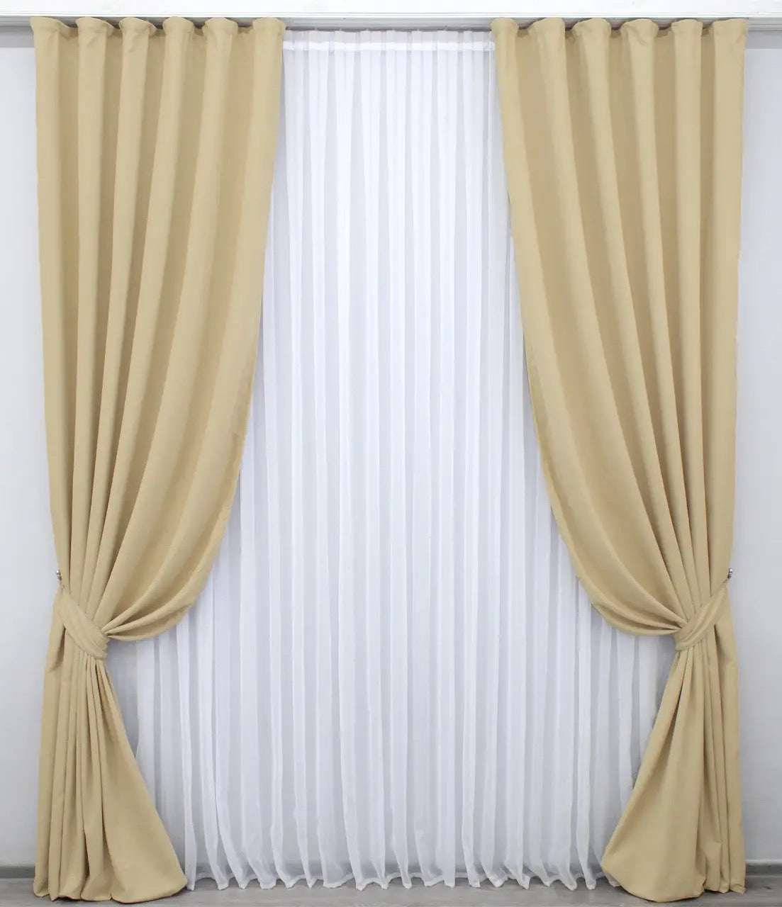 Premium-quality neutral velvet curtains with a smooth texture for stylish bedrooms and living rooms.
