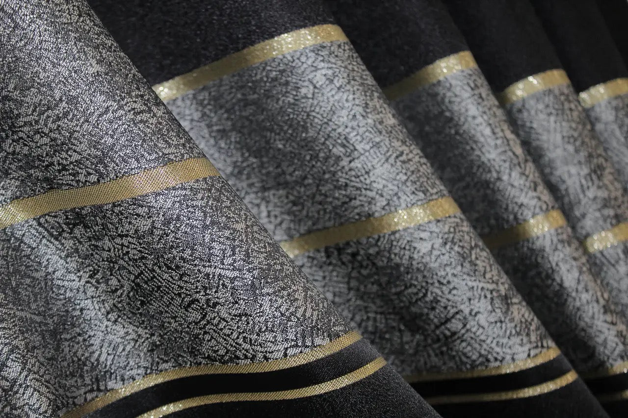 Premium-quality black-grey curtains with gold border, perfect for minimalist and modern decor.
