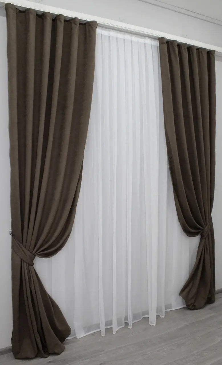 Premium-quality dark brown curtains with a smooth texture for stylish bedrooms and living rooms.
