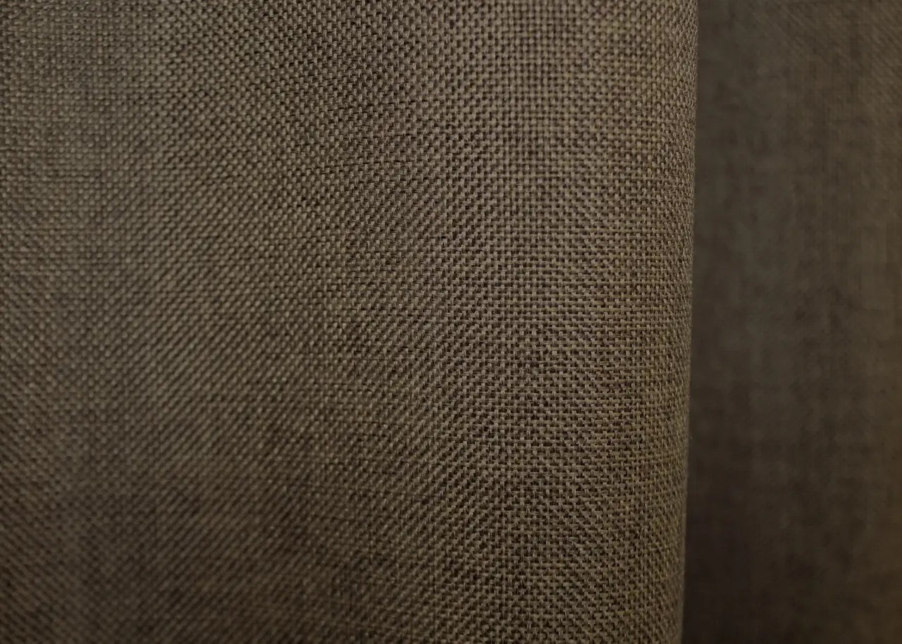 Premium organic linen curtains with a natural weave, enhancing privacy while allowing soft daylight.
