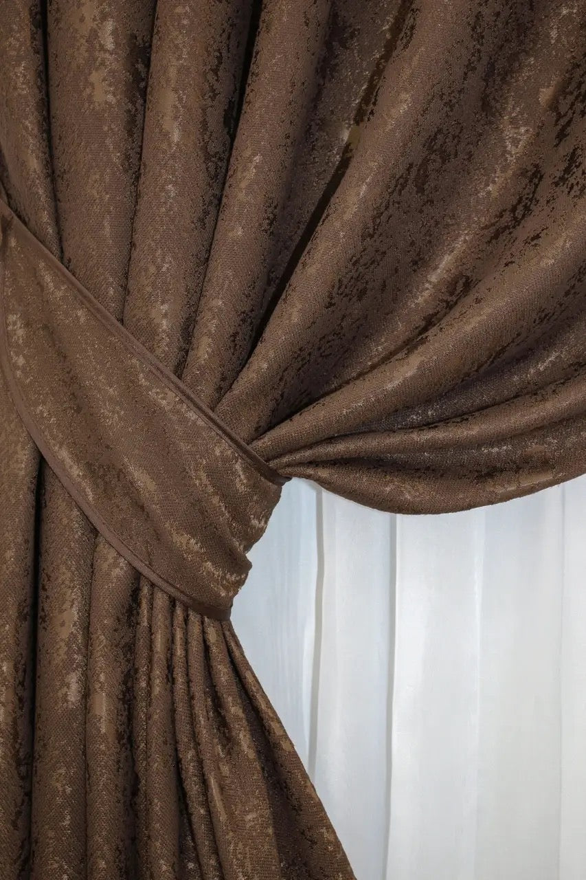 Premium brown linen curtains with a soft marble design, enhancing warmth and style.
