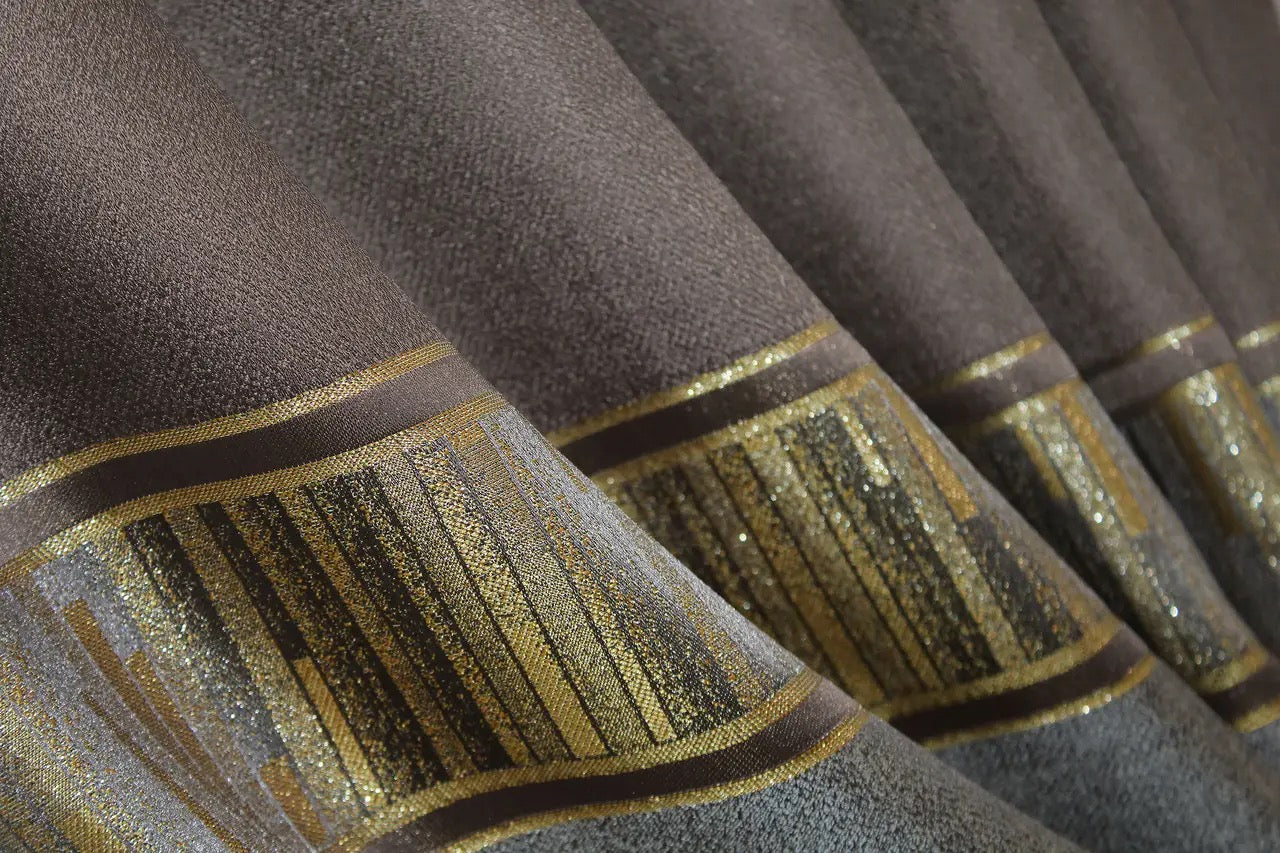 Sophisticated dark cocoa and gold linen curtains with a modern striped design for a stylish home upgrade.
