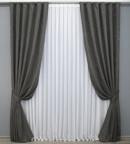 Minimalist dark grey curtains with a refined texture, ideal for stylish bedrooms and living rooms.
