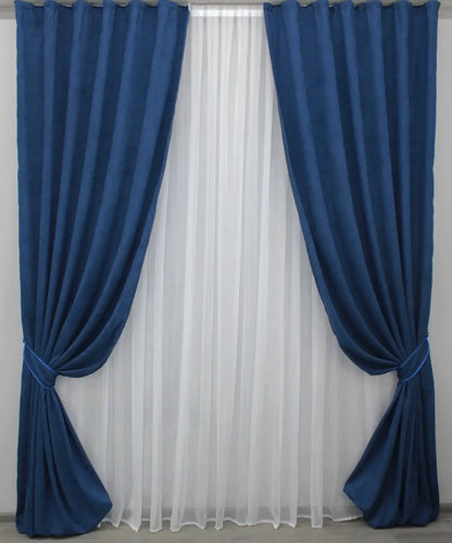 Premium-quality dark blue curtains with a smooth texture for stylish bedrooms and living rooms.
