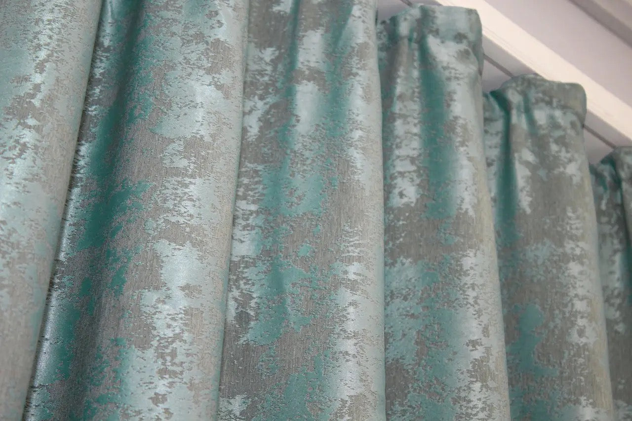 High-quality dusty aqua jacquard curtains with a modern soft finish, creating a cozy yet stylish ambiance.
