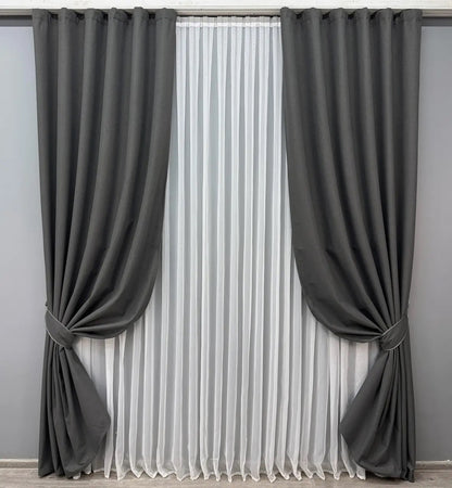 Elegant graphite blackout curtains made from natural linen fabric, designed for total darkness and energy efficiency.
