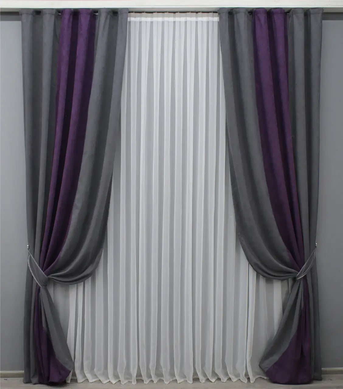 Premium graphite and deep plum combined microvelvet curtains, ideal for creating a modern, elegant atmosphere with soft, inviting texture and privacy.
