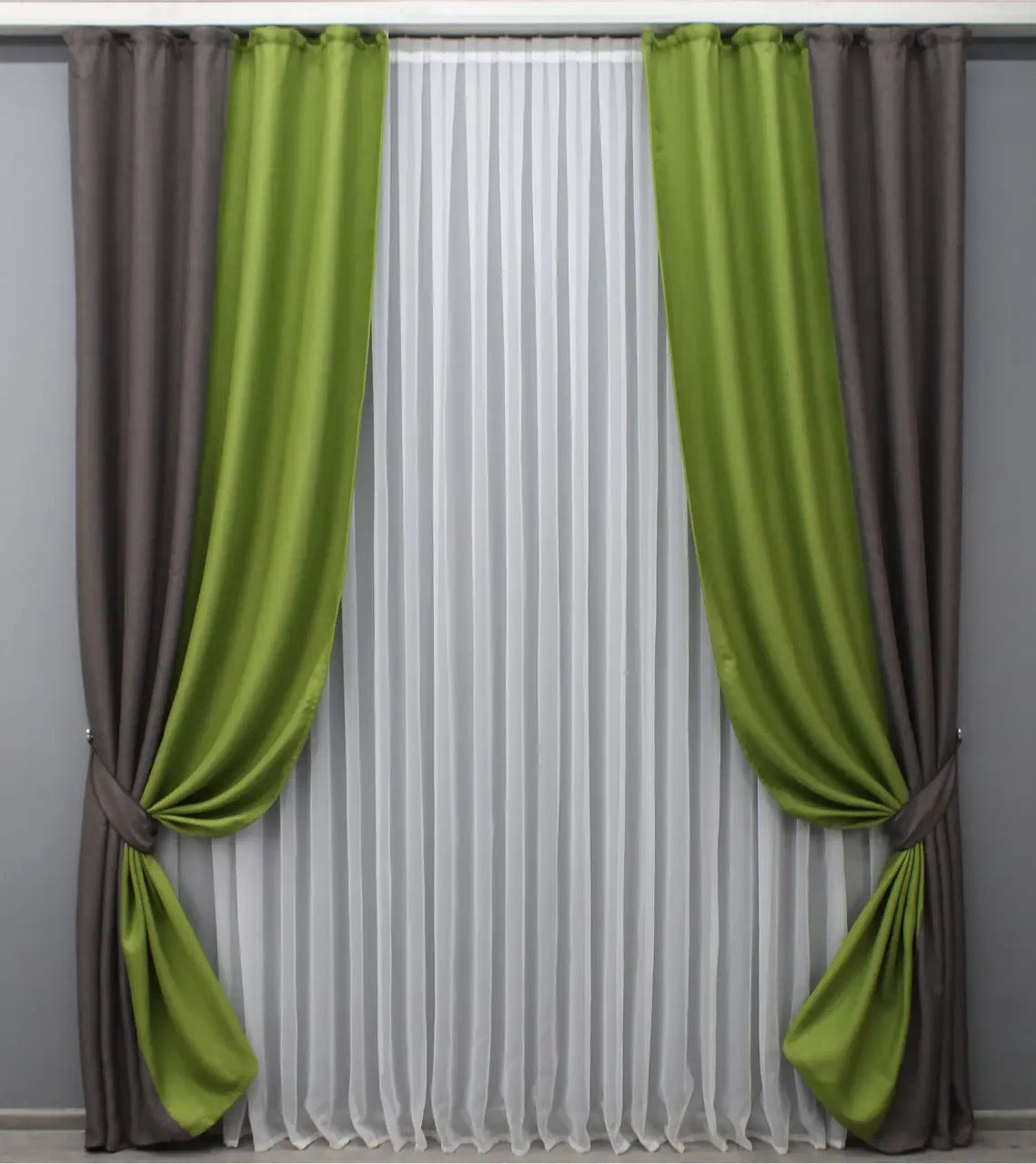 Premium linen blackout curtains featuring a grey-brown base with a vibrant lime green accent, offering a modern and earthy aesthetic.
