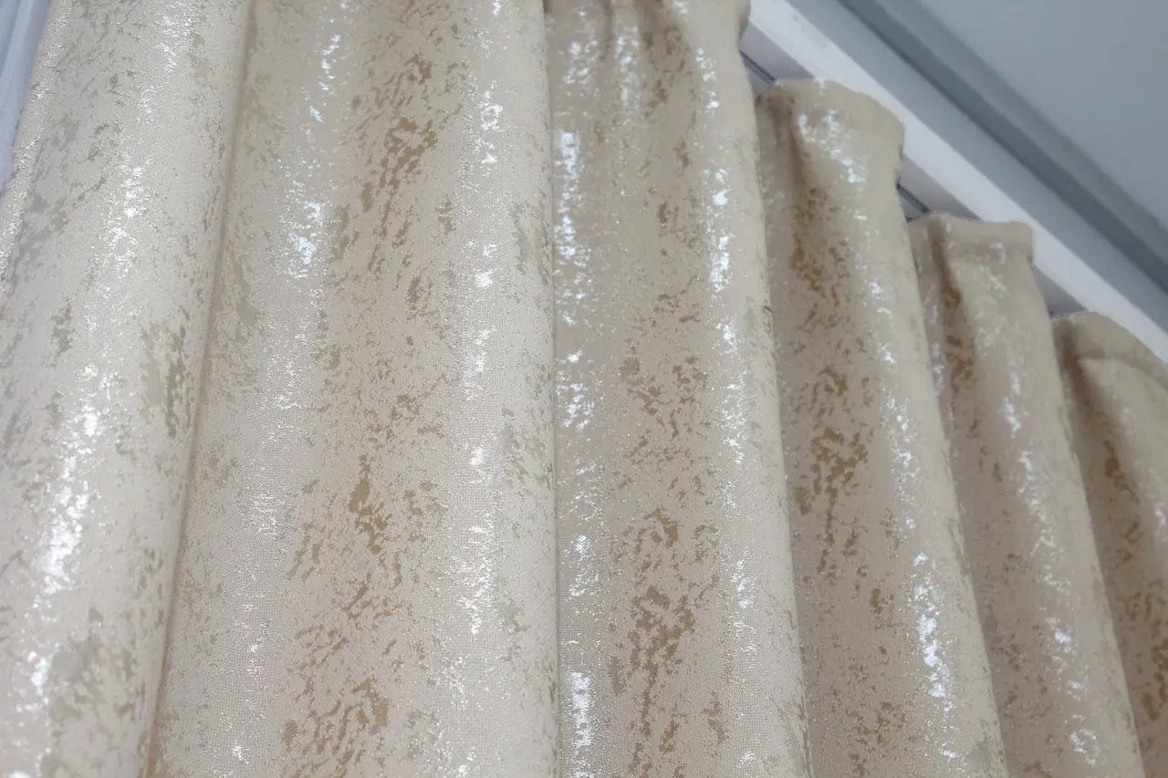 Classic and refined light beige linen curtains, providing privacy while allowing soft, diffused natural light.
