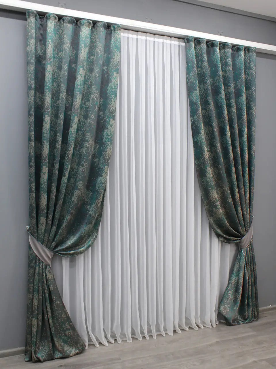 Luxury deep teal and charcoal grey linen curtains designed for stylish and sophisticated living spaces.
