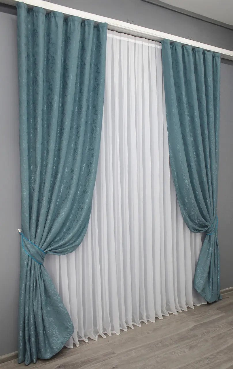 Premium-quality linen curtains in a refreshing azure shade, ideal for living rooms and bedrooms.
