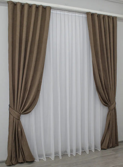 Plush mocha velvet drapes with a soft finish, adding warmth and refinement to any space.
