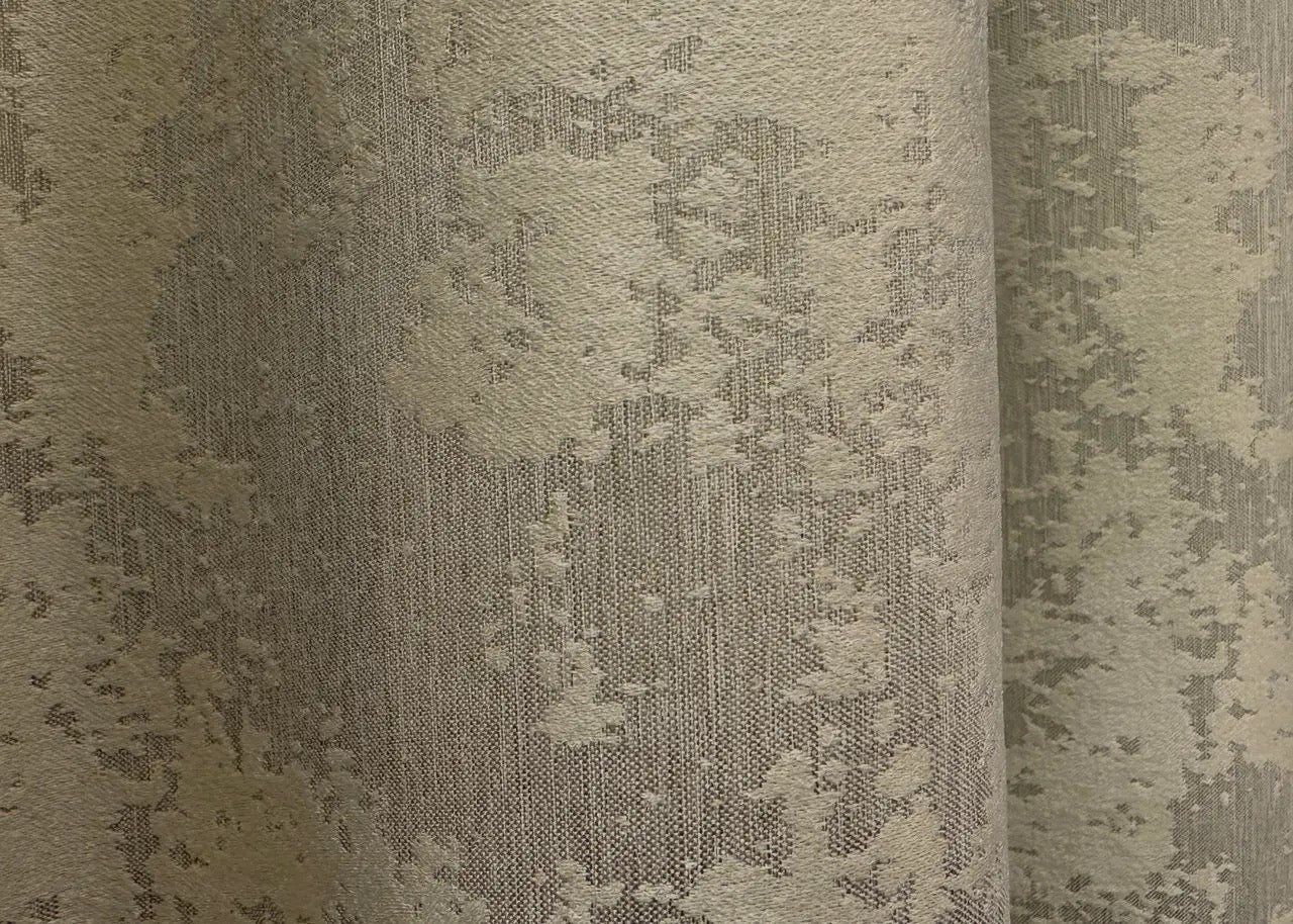 Premium soft beige jacquard curtains with a delicate pattern, perfect for a cozy yet stylish home décor.
