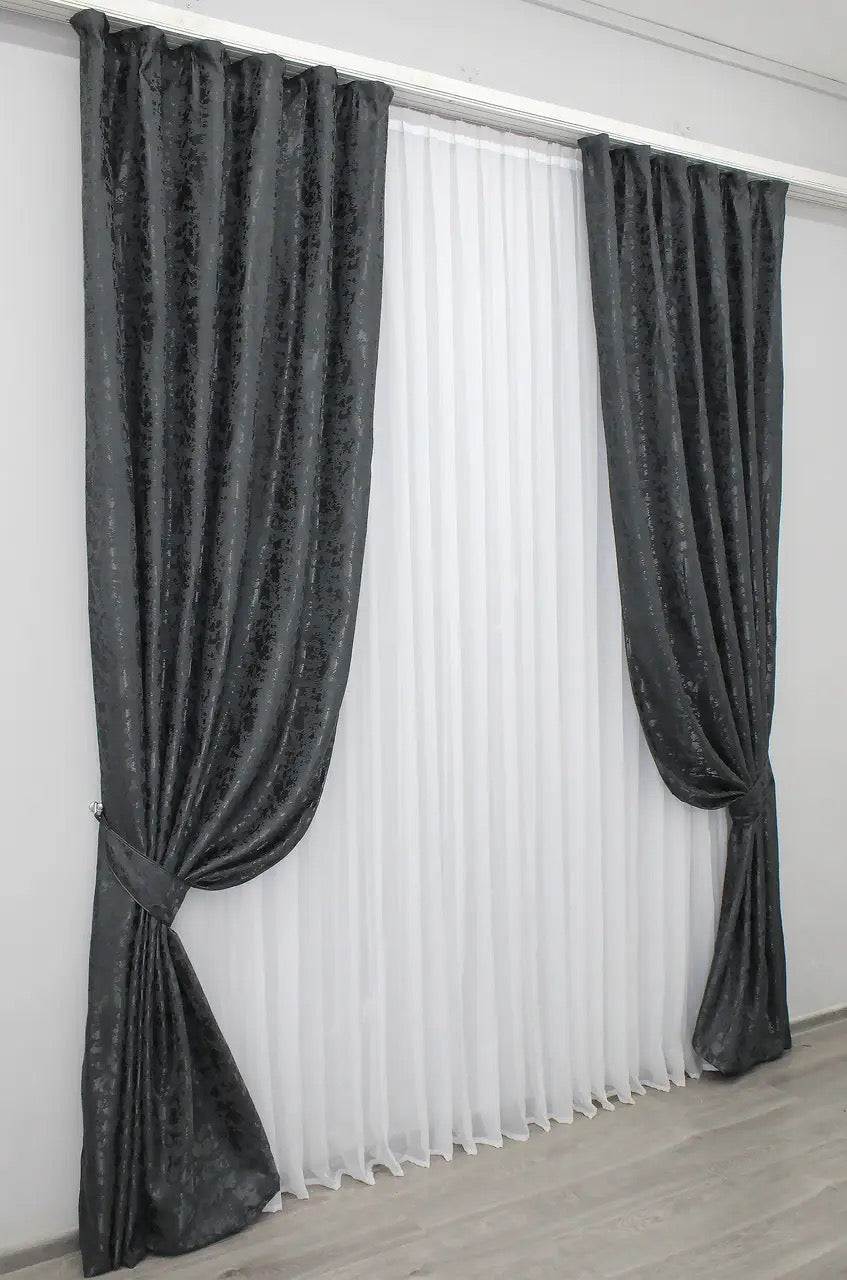 High-quality blue-graphite linen curtains with a luxurious pattern, enhancing refinement in living spaces.
