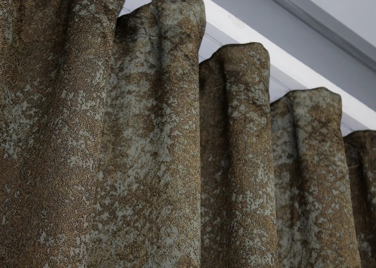 Stylish brown-grey linen curtains with natural texture, enhancing both traditional and modern spaces.
