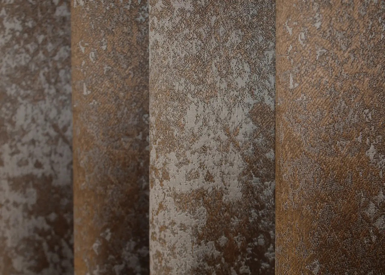 Versatile copper-grey linen drapes that blend warmth and modernity, enhancing both neutral and bold interiors.
