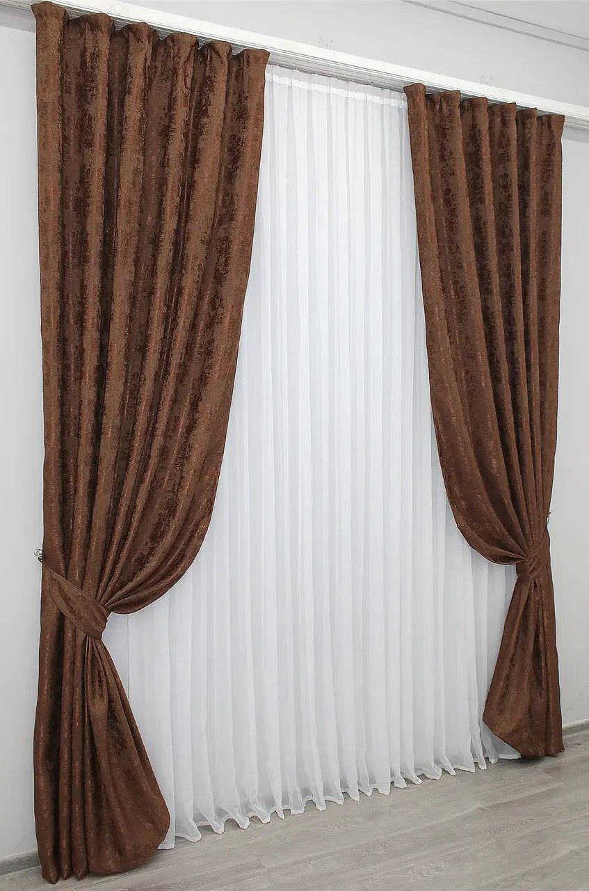 Stylish brown-burgundy jacquard curtains designed for privacy and light filtering, creating a cozy and inviting atmosphere.
