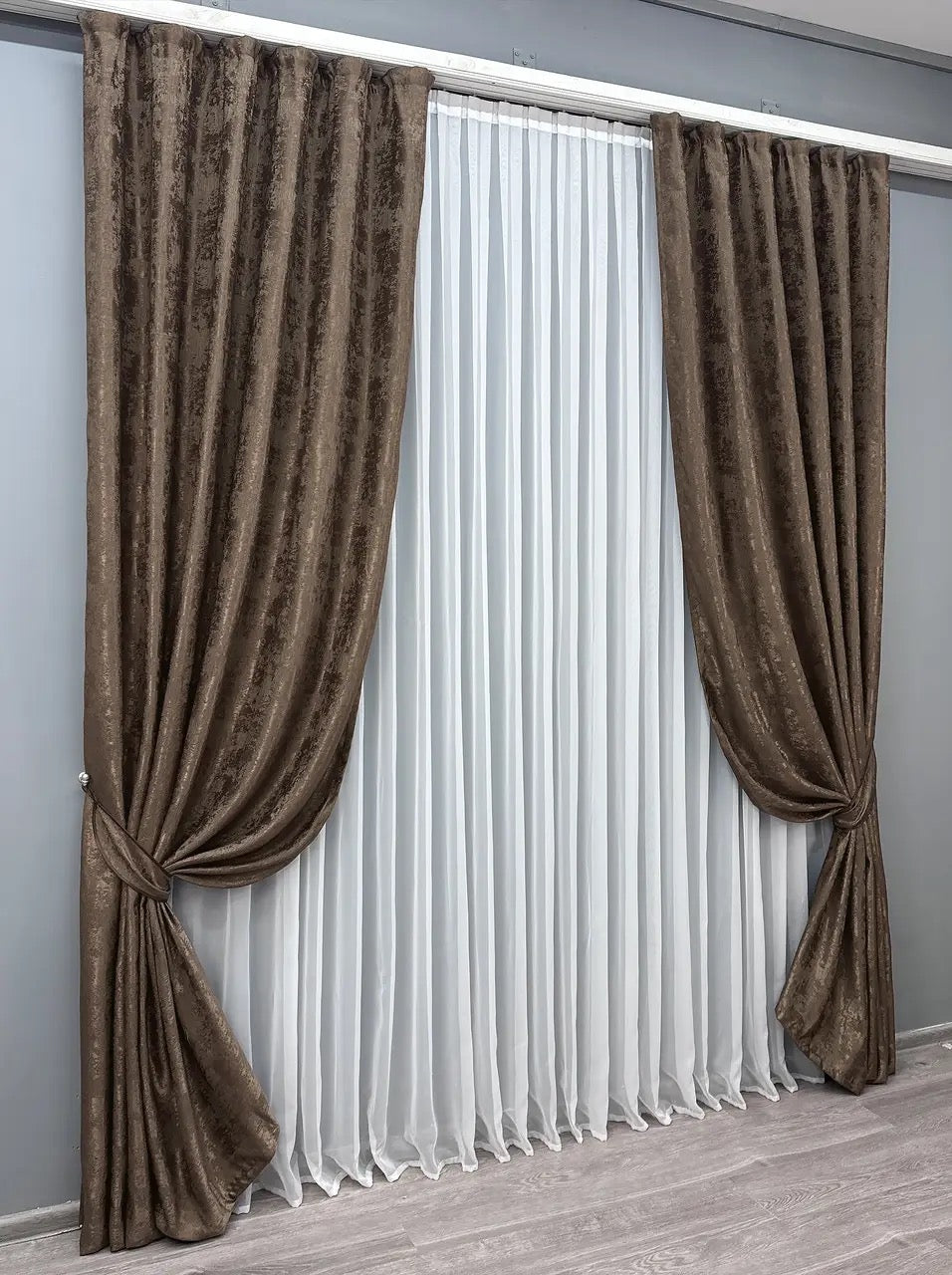 Stylish brown curtains designed with a deep, luxurious tone, ideal for both contemporary and classic interior styles.
