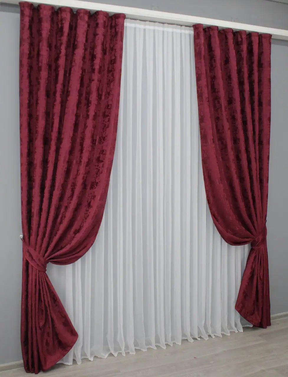 Stylish burgundy curtains designed with a bold, opulent tone, ideal for classic and contemporary interior styles.
