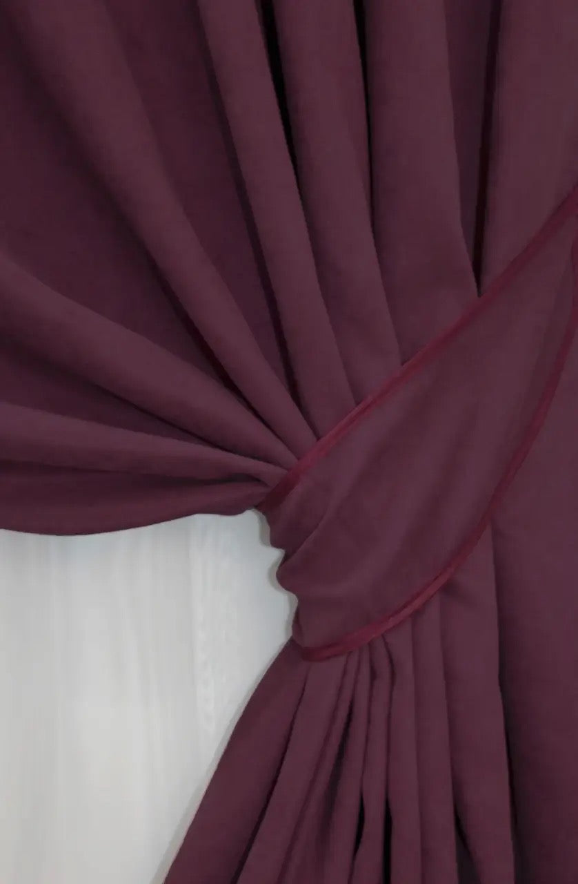 Classic deep red microvelvet curtains, bringing warmth and sophistication to any room.
