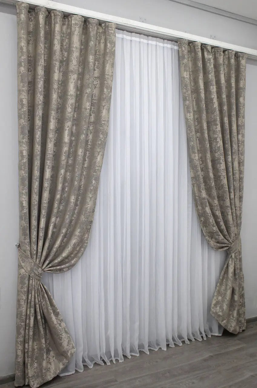 Stylish coffee-grey jacquard curtains designed with 70% light-blocking fabric for privacy while allowing soft natural light.
