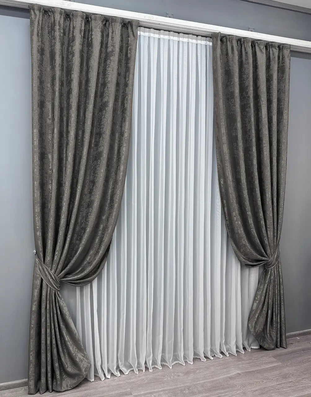 Stylish dark grey curtains designed with a sleek, modern tone, ideal for both contemporary and classic interior styles.
