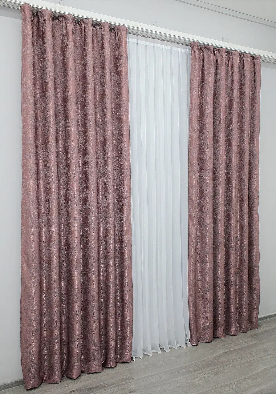 Vibrant raspberry grey curtains with a sophisticated tone, blending seamlessly into contemporary and classic interior designs.
